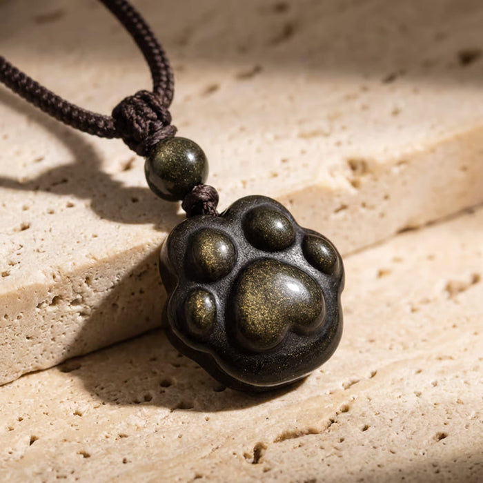 "Link Eternal" Pfotenanhänger aus goldenem Obsidian